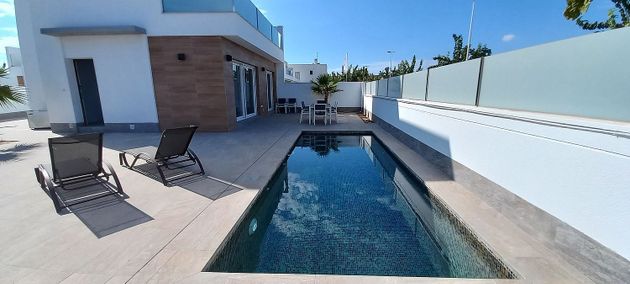 Foto 2 de Chalet en venta en calle Pintor Claudio Coello de 4 habitaciones con terraza y piscina