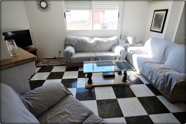 Foto 1 de Casa adossada en venda a Miramar de 4 habitacions amb garatge i balcó