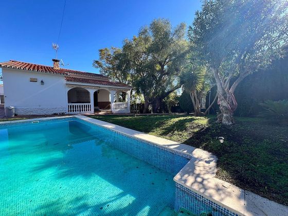 Foto 1 de Venta de chalet en El Pinar - Palacio de Congresos de 5 habitaciones con terraza y piscina