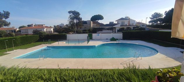 Foto 1 de Piso en venta en Punta Umbría de 3 habitaciones con terraza y piscina