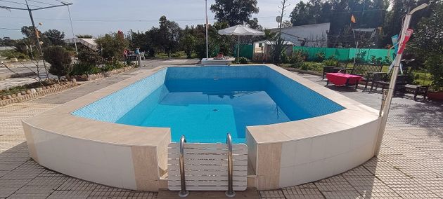 Foto 1 de Venta de casa rural en Gibraleón de 5 habitaciones con terraza y piscina