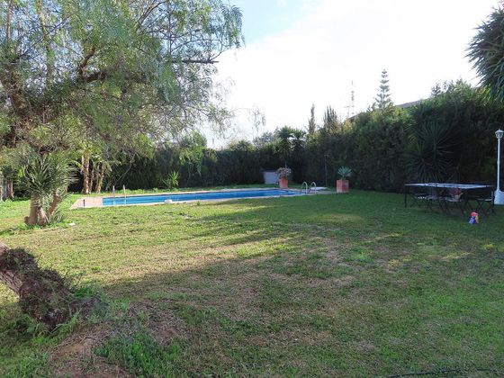 Foto 1 de Casa en venda a Espartinas de 4 habitacions amb piscina i garatge