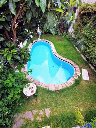 Foto 1 de Piso en venta en calle Santa Marina de 7 habitaciones con terraza y piscina