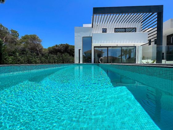 Foto 1 de Xalet en venda a Cabo Pino - Reserva de Marbella de 6 habitacions amb terrassa i piscina