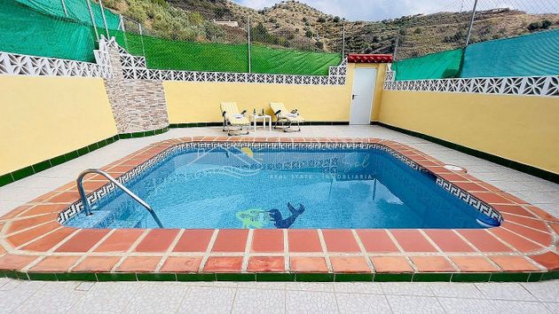 Foto 1 de Casa en lloguer a Torrox Pueblo de 2 habitacions amb terrassa i piscina