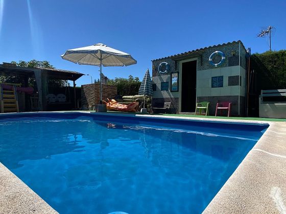Foto 1 de Chalet en venta en Aljaraque de 4 habitaciones con piscina y jardín