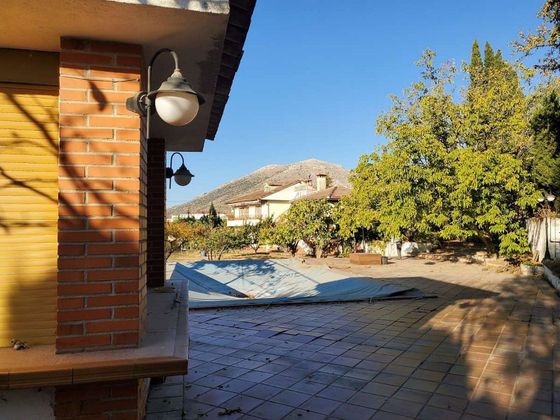 Foto 2 de Venta de casa en Cogollos de la Vega de 4 habitaciones con piscina