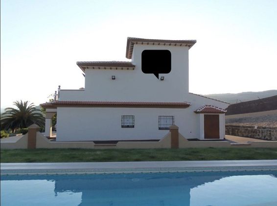 Foto 1 de Chalet en venta en Arriate de 4 habitaciones con terraza y piscina