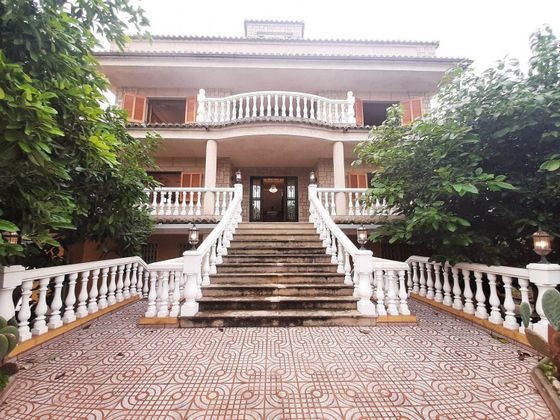 Foto 1 de Casa en venda a Polinyà de Xúquer de 9 habitacions amb terrassa i piscina