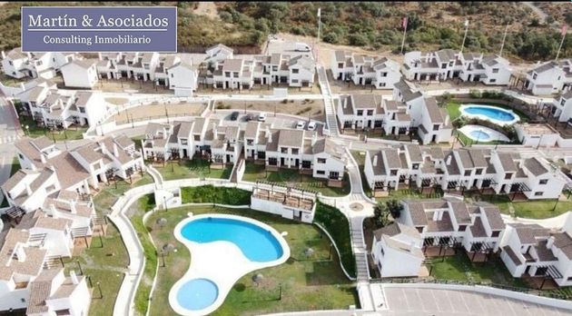 Foto 1 de Venta de casa en Ronquillo (El) de 2 habitaciones con terraza y piscina