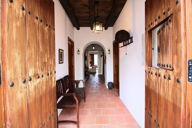 Foto 1 de Casa en venda a Cumbres de Enmedio de 6 habitacions amb terrassa i jardí