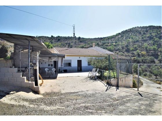 Foto 1 de Casa en venta en Moclinejo de 2 habitaciones con terraza