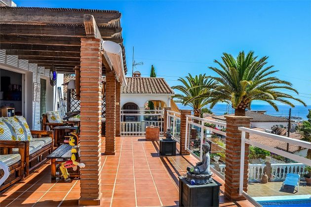 Foto 2 de Venta de casa en Caleta de Vélez de 4 habitaciones con terraza y piscina