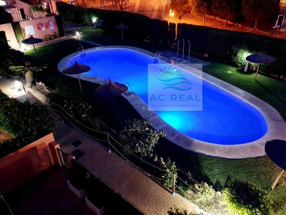 Foto 1 de Casa adossada en venda a Urbasur - Islantilla de 3 habitacions amb terrassa i piscina