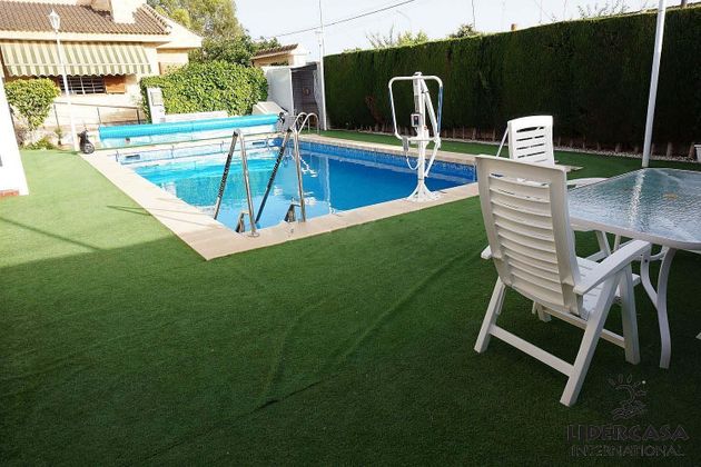 Foto 1 de Xalet en venda a Santiago de la Ribera de 4 habitacions amb terrassa i piscina