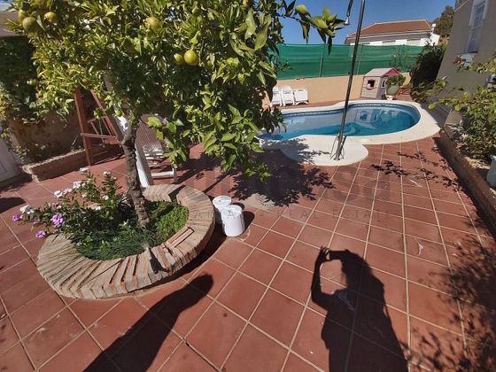Foto 1 de Venta de casa en Puerto de la Torre - Atabal de 5 habitaciones con terraza y piscina