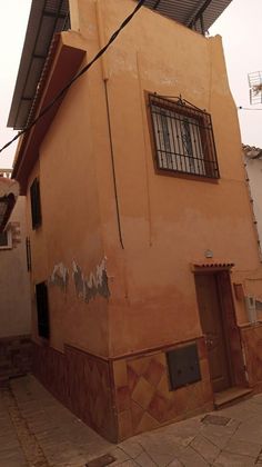 Foto 1 de Casa en venda a Cogollos de la Vega de 3 habitacions amb terrassa