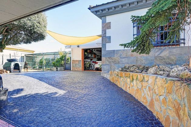 Foto 2 de Venta de casa en Cúllar Vega de 3 habitaciones con terraza y piscina