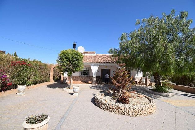 Foto 1 de Venta de casa rural en Moraleda de Zafayona de 3 habitaciones con piscina y jardín