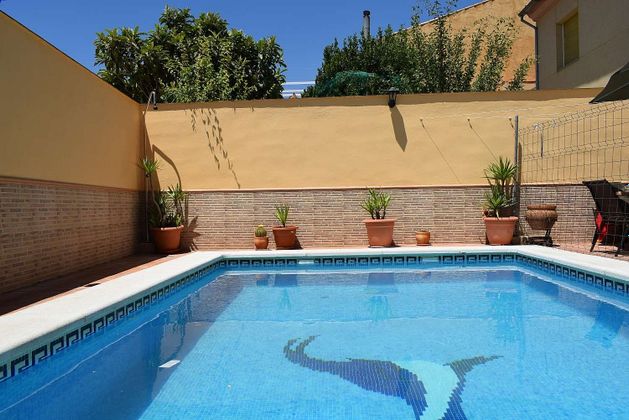 Foto 2 de Casa adosada en venta en calle Zurbarán de 3 habitaciones con piscina y aire acondicionado