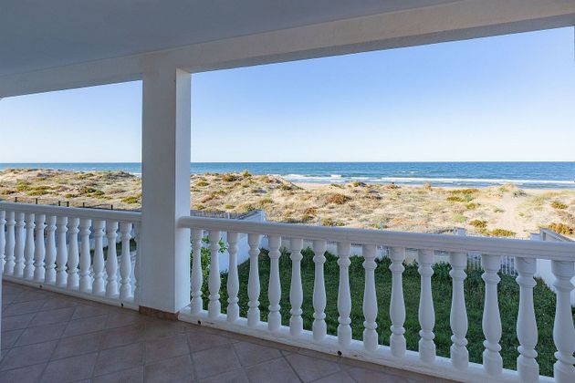 Foto 2 de Xalet en venda a Oliva Nova de 6 habitacions amb terrassa i piscina