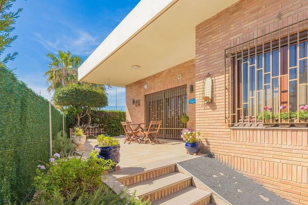 Foto 1 de Casa en venta en Oliva Playa de 3 habitaciones con jardín y aire acondicionado