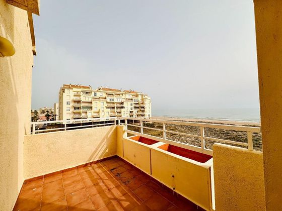 Foto 2 de Venta de piso en El Perellonet de 2 habitaciones con terraza y piscina