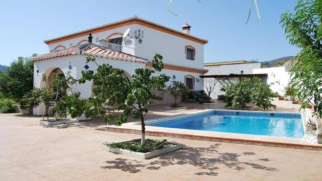 Foto 1 de Casa en venta en Molvízar de 6 habitaciones con terraza y piscina