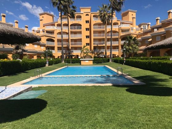 Foto 1 de Alquiler de casa en El Perelló - Les Palmeres - Mareny de Barraquetes de 4 habitaciones con terraza y piscina