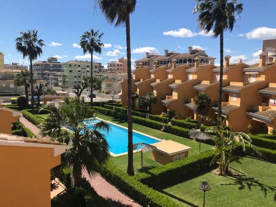 Foto 2 de Alquiler de casa en El Perelló - Les Palmeres - Mareny de Barraquetes de 4 habitaciones con terraza y piscina