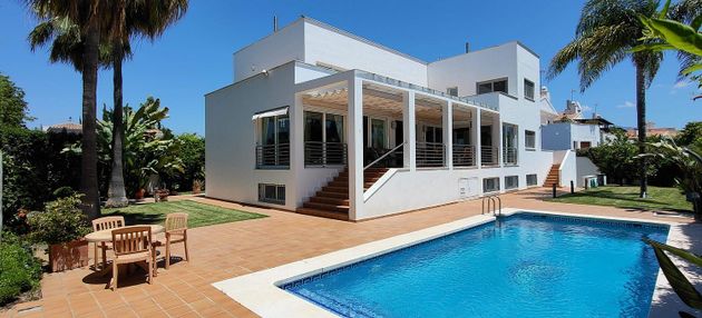 Foto 1 de Chalet en venta en Nueva Alcántara de 6 habitaciones con terraza y piscina