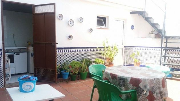 Foto 1 de Casa adossada en venda a Viñuela de 6 habitacions amb terrassa i balcó