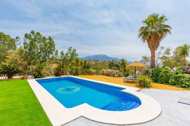 Foto 2 de Venta de chalet en Viñuela de 4 habitaciones con terraza y piscina