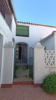 Foto 2 de Casa adosada en venta en calle Cura de 4 habitaciones con terraza y jardín