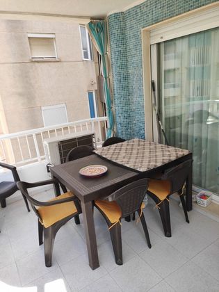 Foto 1 de Piso en venta en calle Llaurí de 3 habitaciones con terraza y piscina