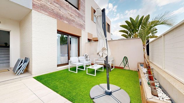Foto 2 de Casa adossada en venda a avenida Futbolista Antonio Ruiz Cervilla de 3 habitacions amb terrassa i jardí