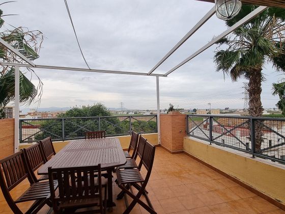Foto 1 de Casa adosada en venta en Almàssera de 4 habitaciones con terraza y piscina