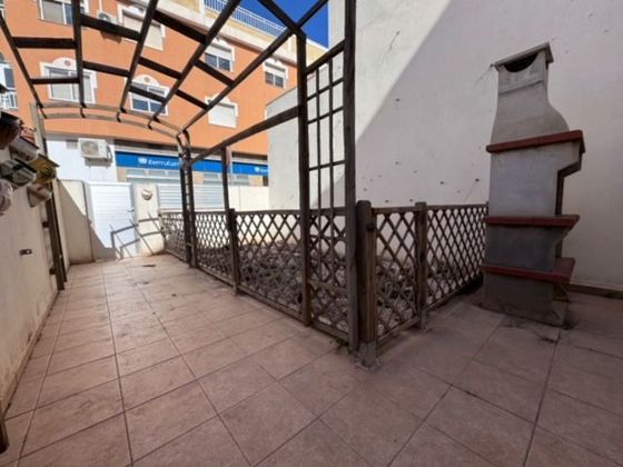 Foto 1 de Venta de dúplex en calle Escorial de 4 habitaciones con terraza y garaje