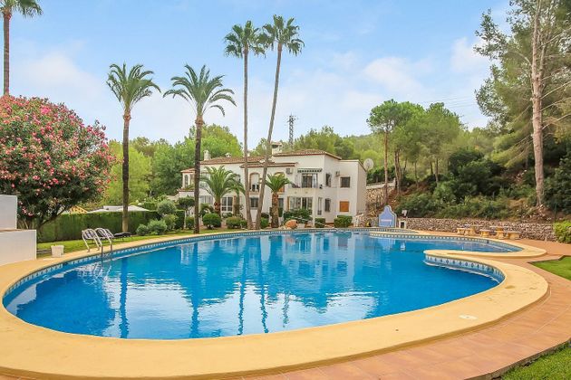 Foto 1 de Casa adossada en venda a Pedreguer de 4 habitacions amb terrassa i piscina