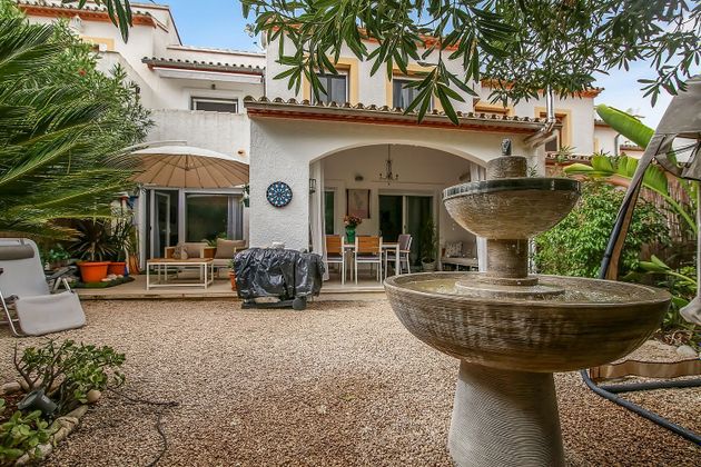 Foto 2 de Casa adossada en venda a Pedreguer de 4 habitacions amb terrassa i piscina
