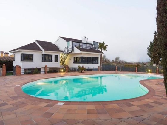 Foto 1 de Venta de chalet en calle Condado de Huelva de 4 habitaciones con terraza y piscina