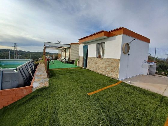 Foto 1 de Venta de chalet en Guillena de 2 habitaciones con piscina y aire acondicionado