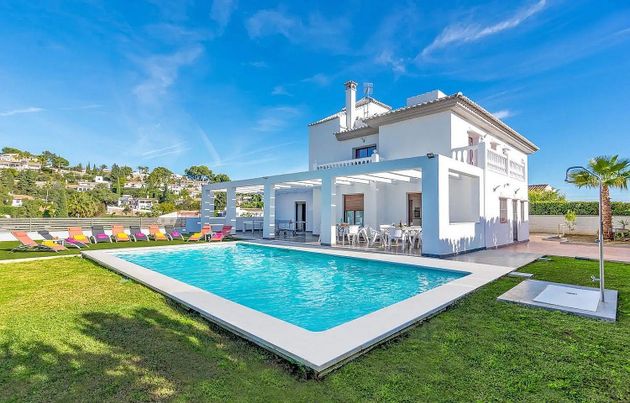 Foto 1 de Casa adossada en venda a Campo de Mijas de 5 habitacions amb terrassa i piscina