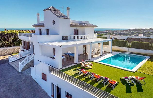 Foto 2 de Casa adossada en venda a Campo de Mijas de 5 habitacions amb terrassa i piscina