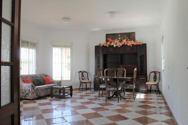 Foto 1 de Chalet en venta en Rociana del Condado de 4 habitaciones con terraza y piscina