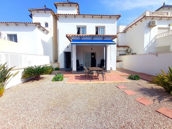 Foto 2 de Casa adosada en venta en Los Puertos de 3 habitaciones con terraza y piscina