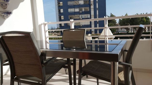 Foto 2 de Venta de piso en Playa del Puig de 3 habitaciones con terraza y piscina
