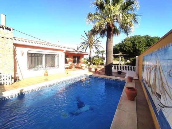 Foto 1 de Venta de chalet en Los Urrutias de 3 habitaciones con terraza y piscina