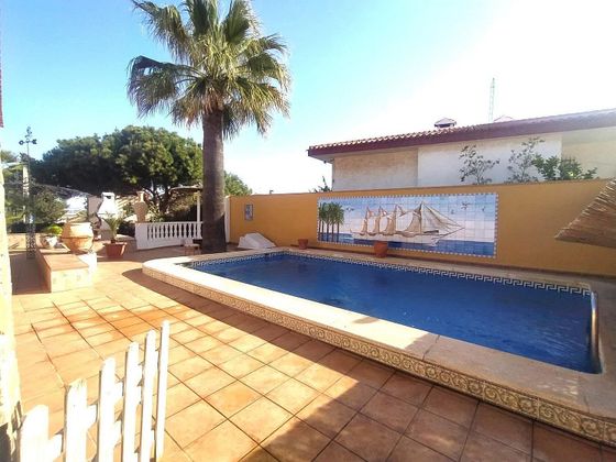 Foto 2 de Venta de chalet en Los Urrutias de 3 habitaciones con terraza y piscina