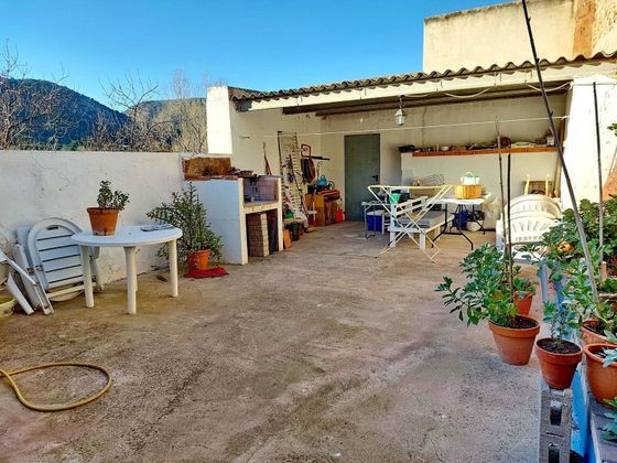 Foto 1 de Casa adossada en venda a Olocau de 4 habitacions amb terrassa i jardí